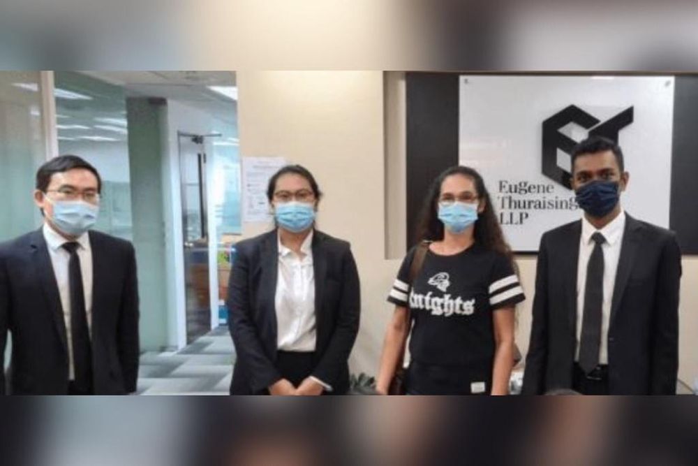 Portela Vilma Jimenez (third left), with her lawyers Suang Wijaya, Syazana Yahya and Ariffin Sha of Eugene Thuraisingam LLP. u00e2u20acu201d Eugene Thuraisingam LLP pic via TODAY