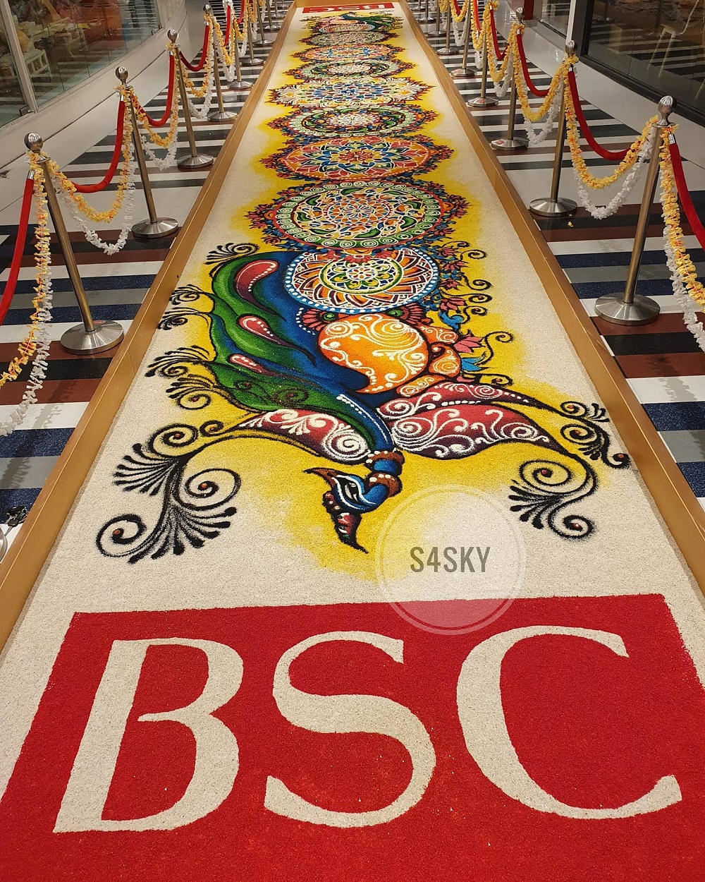 Ruben and his team created an elaborate kolam for Bangsar Shopping Centre measuring 60 by seven feet. — Picture from Facebook/s4skyrangolikolammalaysia