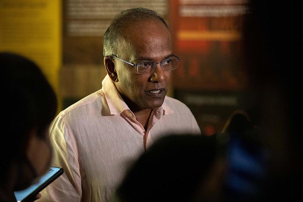 Law and Home Affairs Minister K Shanmugam speaking to reporters after addressing a seminar organised by the Religious Rehabilitation Group November 24, 2020. u00e2u20acu201d TODAY pic