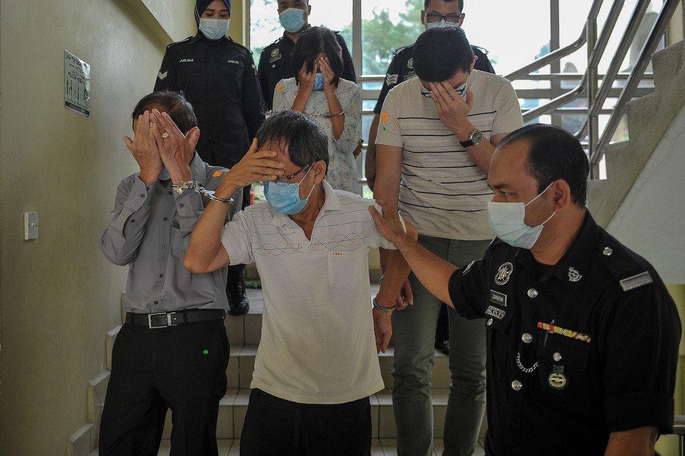 Ong Seng Khek, 71, Low Sze Wai, 66, Siow Lee Chen, 66, and Ong Chee Ming, 34, each pleaded not guilty to the charge read out to them before Judge Syafeera Mohd Said at the Selayang Sessions Court November 9, 2020. — Bernama pic
