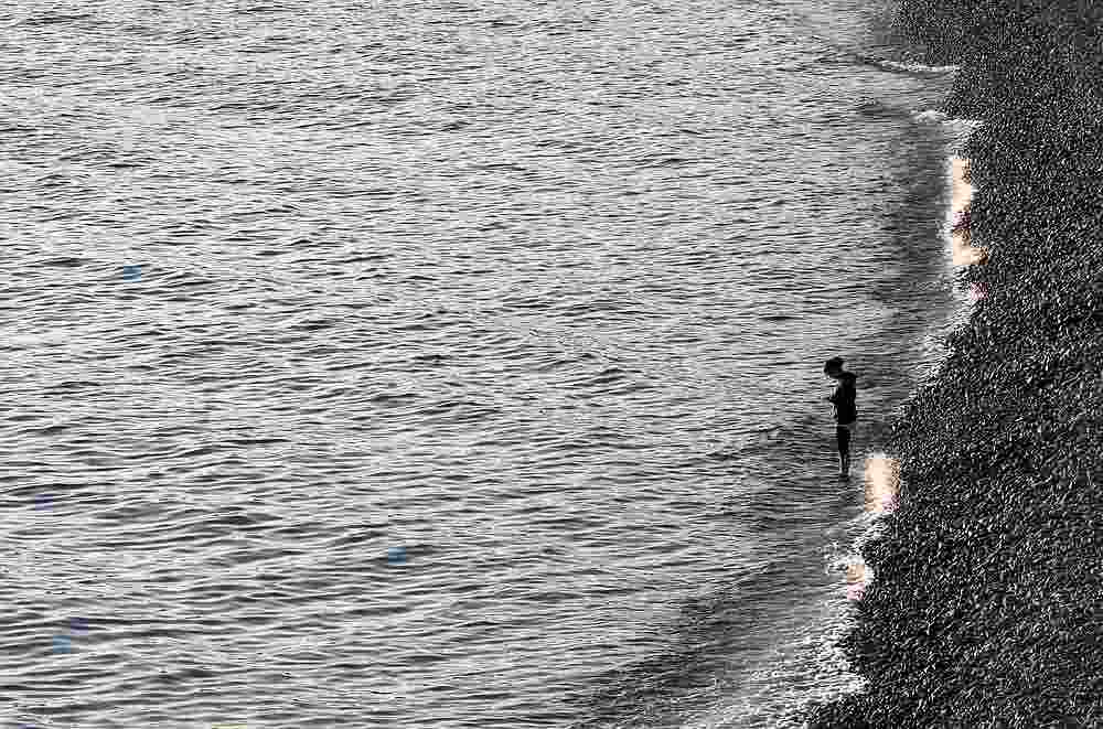 A woman is seen on the beach of the Promenade des Anglais during the second national Covid-19 lockdown in Nice, France November 6, 2020.u00e2u20acu201d Reuters pic