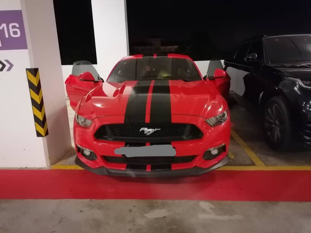 Investigators confiscated a Rolls-Royce limousine, a Ford Mustang, a Range Rover and an Audi during the raid. — Picture from social media