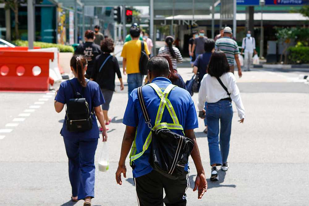 The Workers' Party recently argued in Parliament for a minimum wage of S$1,300 for Singapore, but the government rebutted that this could lead to higher unemployment. u00e2u20acu201d TODAY pic