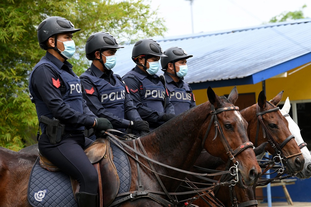 PDRM Mounted Unit commanding officer, DSP Nurhidayah Damanhoori said 19 members and an officer with the strength of eight horses had started patrolling to assist Op Benteng. u00e2u20acu2022 Bernama pic