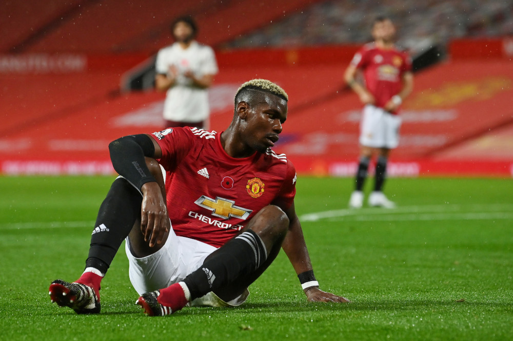 Manchester Unitedu00e2u20acu2122s Paul Pogba reacts after fouling Arsenalu00e2u20acu2122s Hector Bellerin resulting in Arsenal being awarded a penalty by referee Mike Dean during their match at Old Trafford, Manchester November 1, 2020. u00e2u20acu201d Picture by Paul Ellis/Pool via Reuters