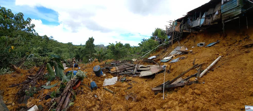 The back portion of Rh Jarau, Kampung Dayak, Sungai Plan in Bintulu affected by a landslide. u00e2u20acu201d Borneo Post pic