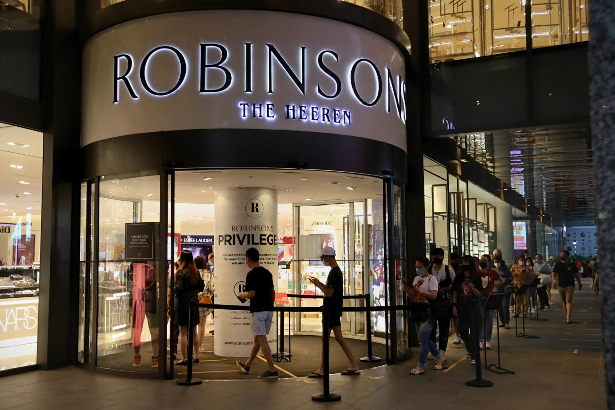 The queue of customers entering Robinsons at The Heeren did not let up as the sun set on Oct 30, 2020. — TODAY pic