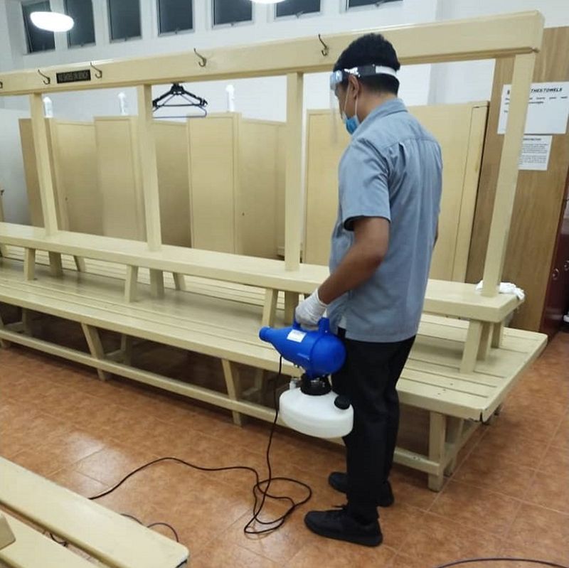 A Royal Selangor Golf Club staff sprays disinfectant within its premises in Kuala Lumpur June 3, 2020. u00e2u20acu201d Picture via Facebook