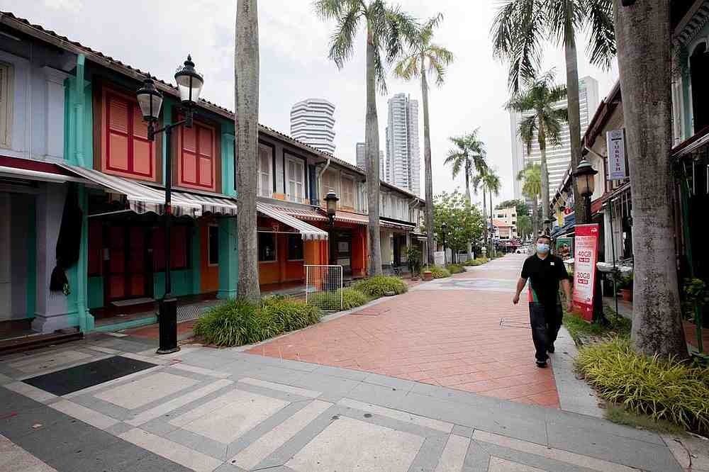 Shops along Bussorah Street, Singapore seen closed May 29, 2020. Two new schemes have been rolled out to help small- and medium-sized enterprises restructure their debts. u00e2u20acu201d TODAY pic