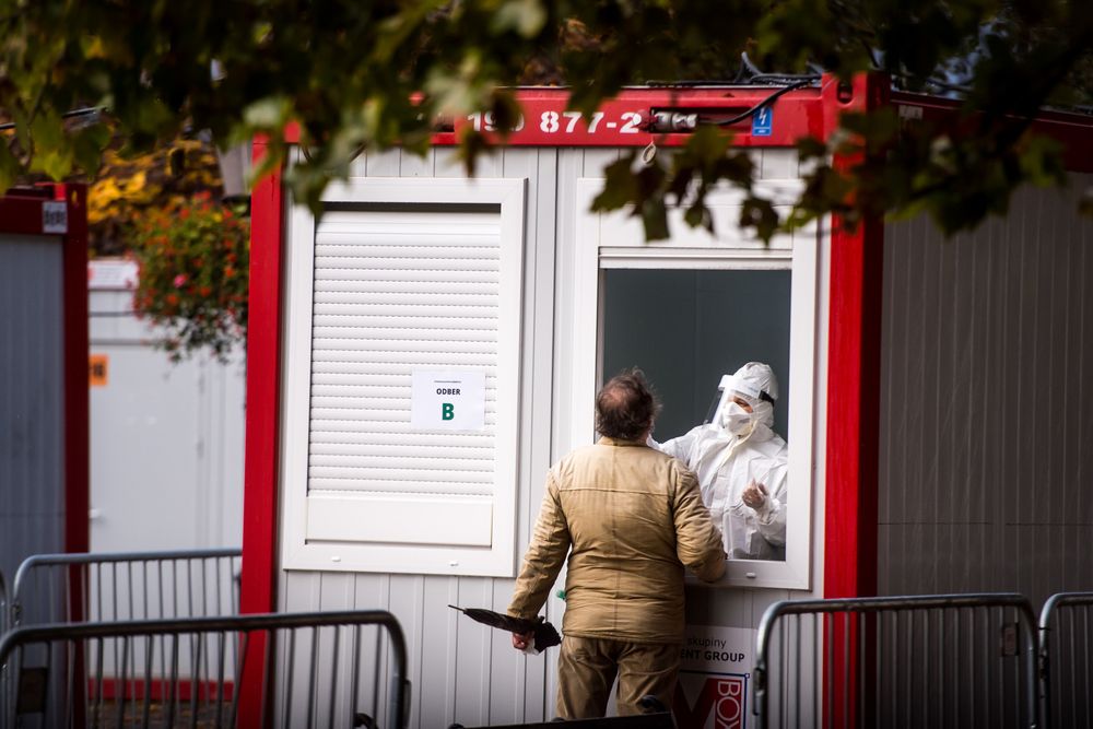 A medic test a man for the novel coronavirus Covid-19 during nationwide testing in Bratislava, Slovakia on October 31, 2020. u00e2u20acu201d AFP pic