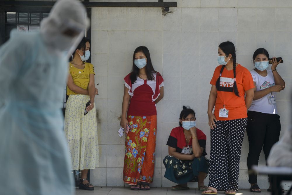 Foreign workers wait to get tested for Covid-19 at Top Gloveu00e2u20acu2122s female staff dormitory in Klang November 18, 2020. u00e2u20acu201d Picture by MIera Zulyana