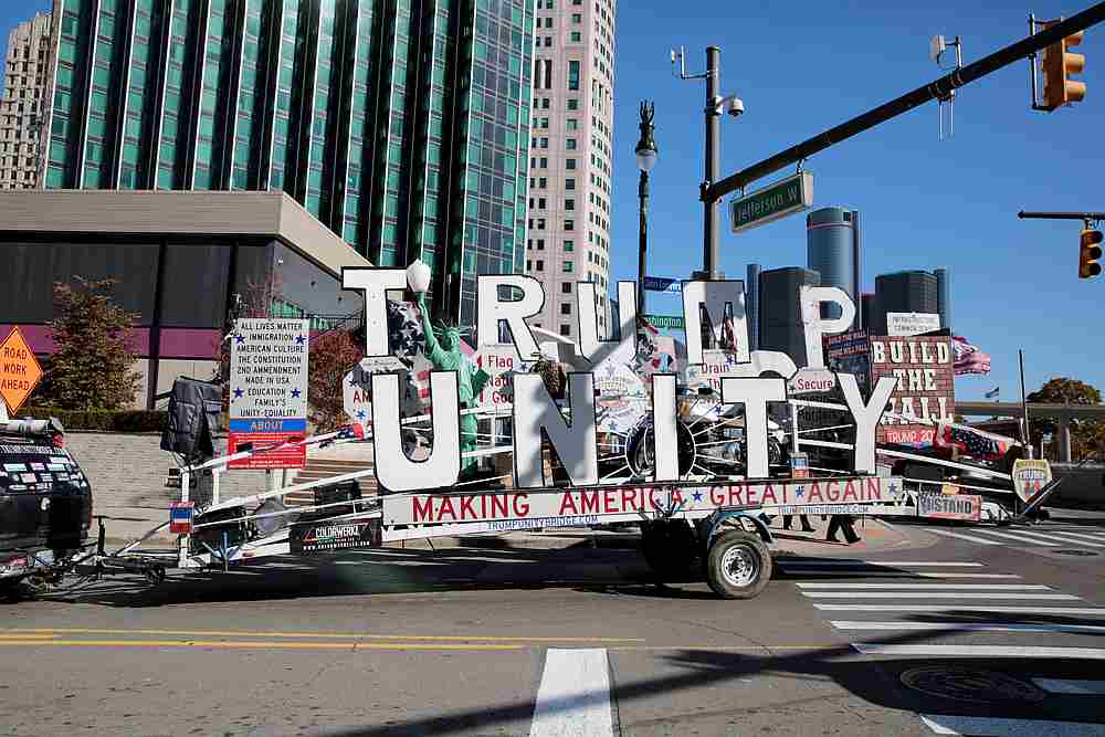 A supporter of US President Donald Trump talks through a loudspeaker while driving his Trump Unity Bridge outside after Election Day in Detroit, Michigan November 4, 2020. u00e2u20acu201d Reuters pic