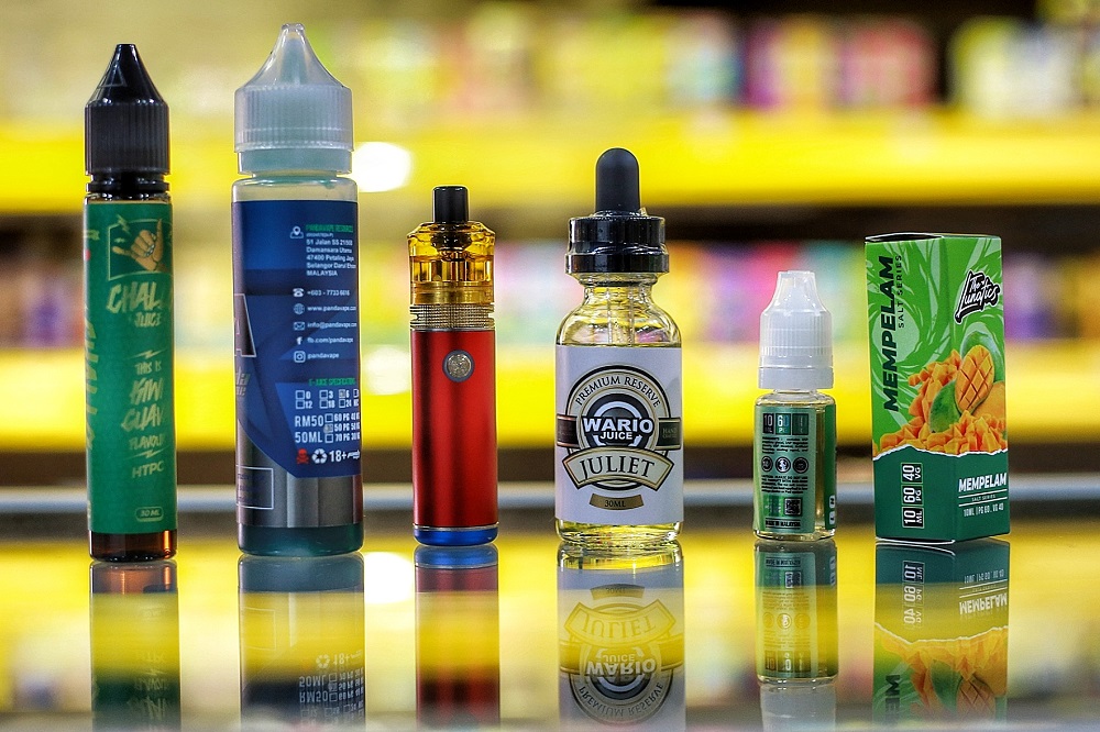 Vape users have a choice of different brands of liquids in different flavours. u00e2u20acu2022 Picture by Ahmad Zamzahuri