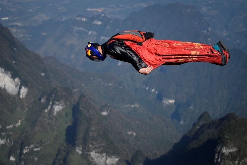 Zhang Shupeng in flight during a wingsuit jump from Tianmen mountain in Zhangjiajie, China. u00e2u20acu201d AFP pic