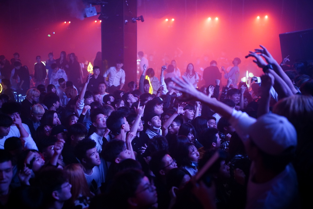 People dance at a nightclub, almost a year after the global outbreak of the coronavirus disease (Covid-19) in Wuhan December 12, 2020. u00e2u20acu201d Reuters pic