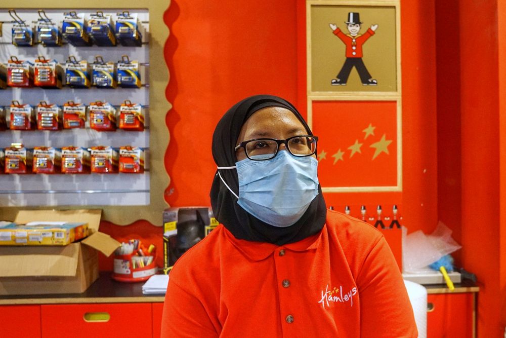 Nur Farah Ain, assistant store manager at toy store Hamleys, speaks to Malay Mail during an interview at the 1 Utama shopping centre in Petaling Jaya December 15, 2020. — Picture by Ahmad Zamzahuri