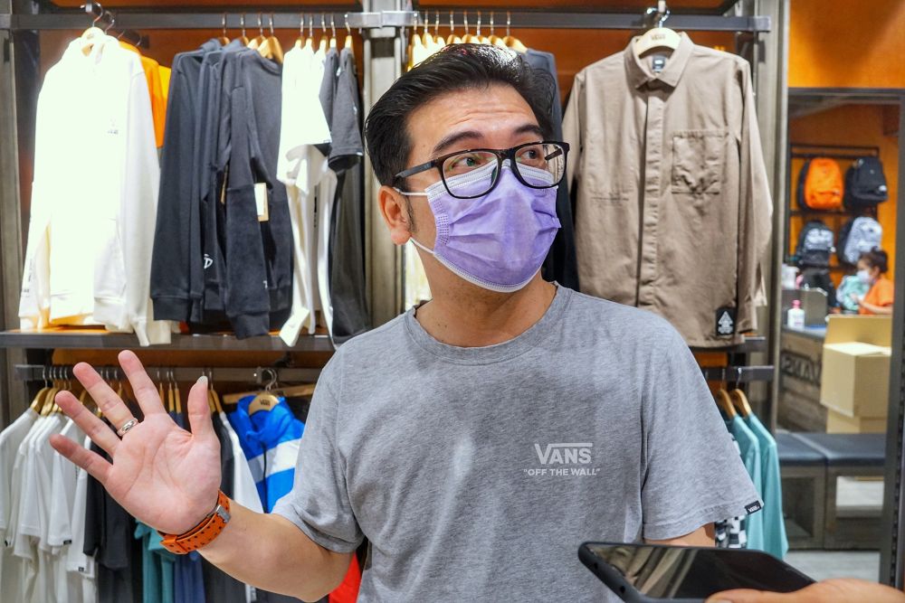 Keith Tan, store manager at Vans, speaks to Malay Mail during an interview at the 1 Utama shopping centre in Petaling Jaya December 15, 2020. — Picture by Ahmad Zamzahuri