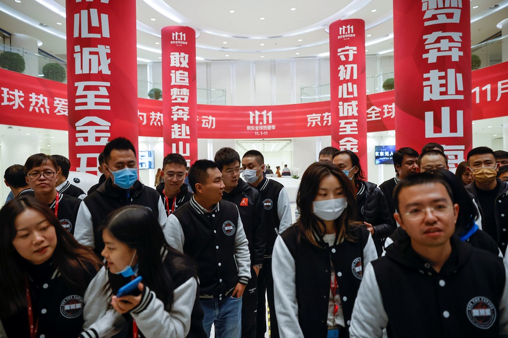 Employees gather for a group photo at JD.com's headquarters on China's Singles Day shopping festival during a government organized tour in Beijing November 11, 2020. u00e2u20acu201d Reuters pic