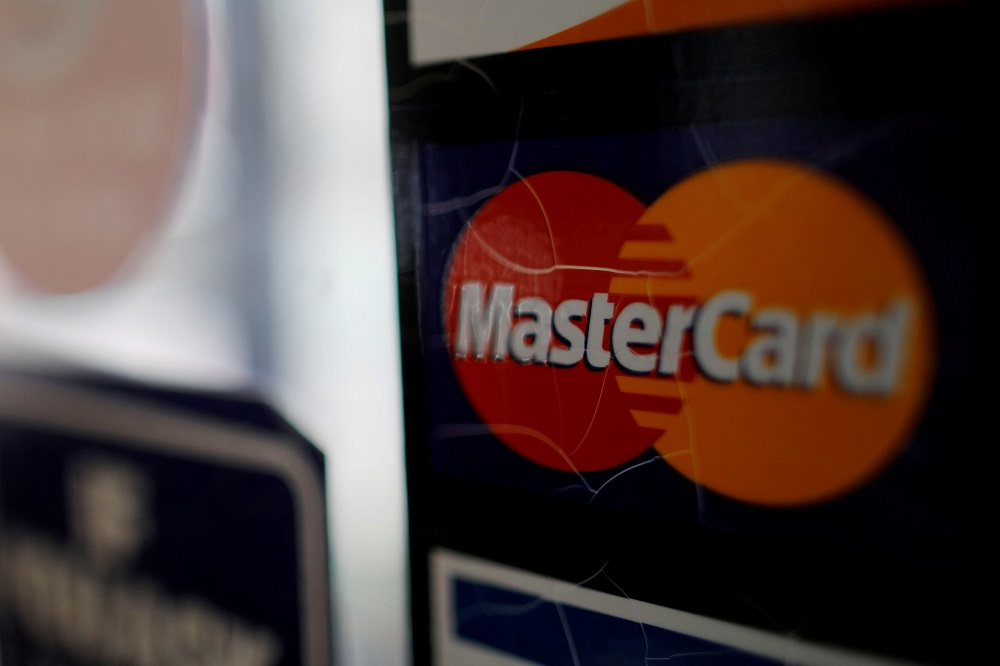 A sticker shows that a store accepts MasterCard in Harvard Square in Cambridge, Massachusetts, US, July 25, 2018. u00e2u20acu201d Reuters pic