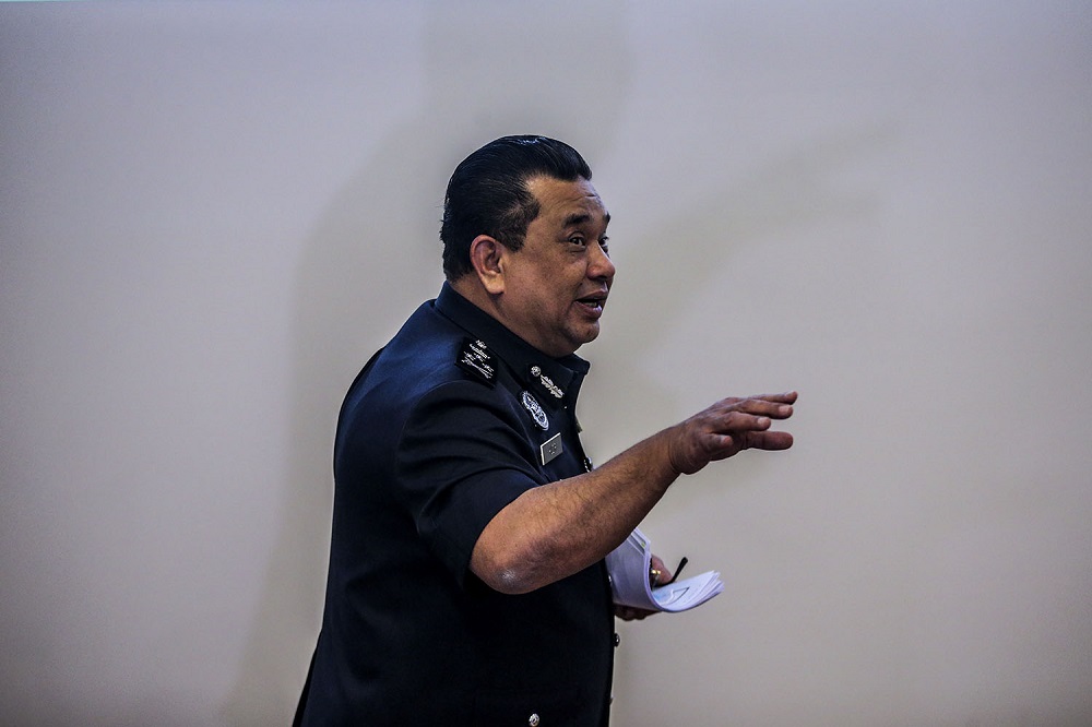 Bukit Aman Criminal Investigation Department (CID) director Datuk Huzir Mohamed leaves after a press conference at Bukit Aman in Kuala Lumpur December 1, 2020. u00e2u20acu201d Picture by Hari Anggara