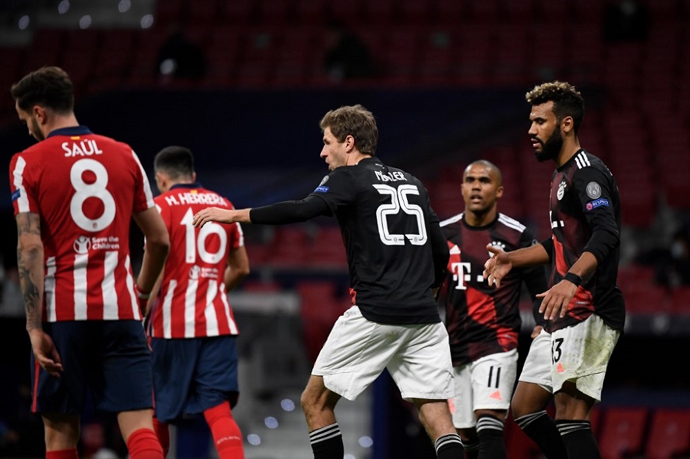 Bayern Munich's German forward Thomas Mueller (centre) celebrates after scoring during the Champions League group A match against Atletico Madrid at the Wanda Metropolitano stadium in Madrid December 1, 2020. u00e2u20acu201d AFP pic