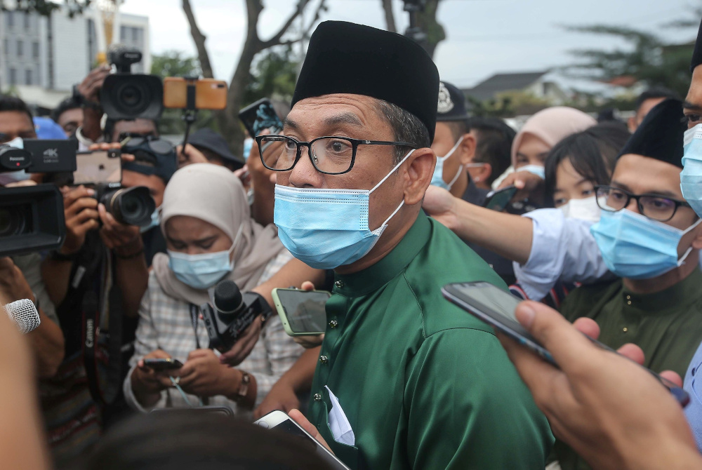 Perak Mentri Besar Datuk Seri Ahmad Faizal Azumu speaks to reporters after seeking an audience with Sultan of Perak Sultan Nazrin Muizzuddin Shah at Istana Kinta in Ipoh December 4, 2020. — Picture by Farhan Najib