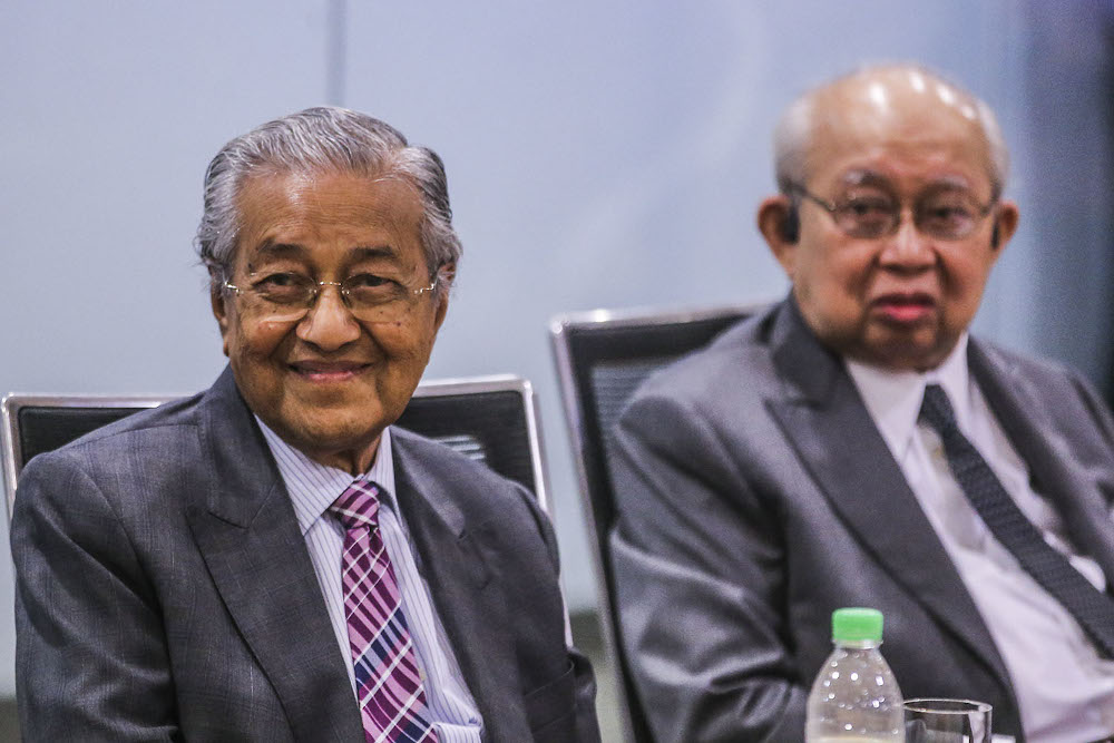Langkawi MP Tun Dr Mahathir Mohamad and Gua Musang MP Tan Sri Tengku Razaleigh Hamzah are seen during a press conference at Yayasan Al Bukhary, Kuala Lumpur December 14, 2020. u00e2u20acu201d Picture by Hari Anggara