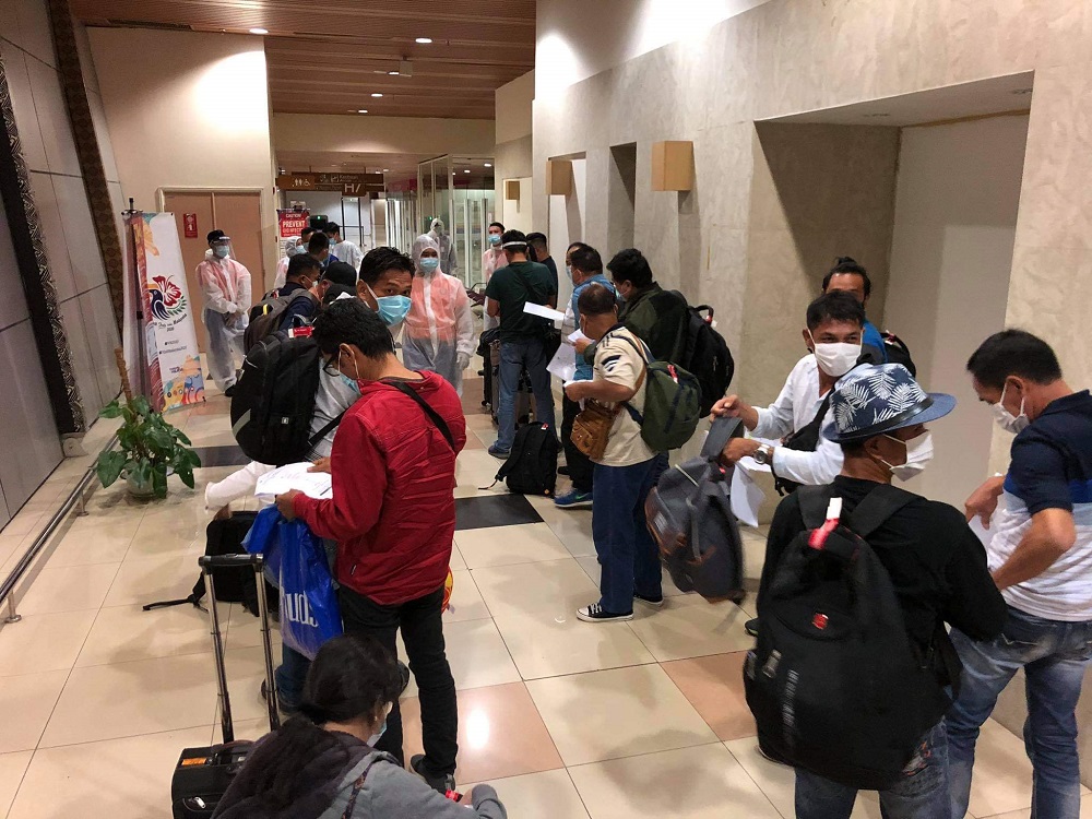 Some of the stranded Malaysians at the Kuching International Airport upon arrival from Papua New Guinea, December 18, 2020. Picture courtesy of Sarawak Ministry of Transport. u00e2u20acu201d Picture by Sulok Tawie