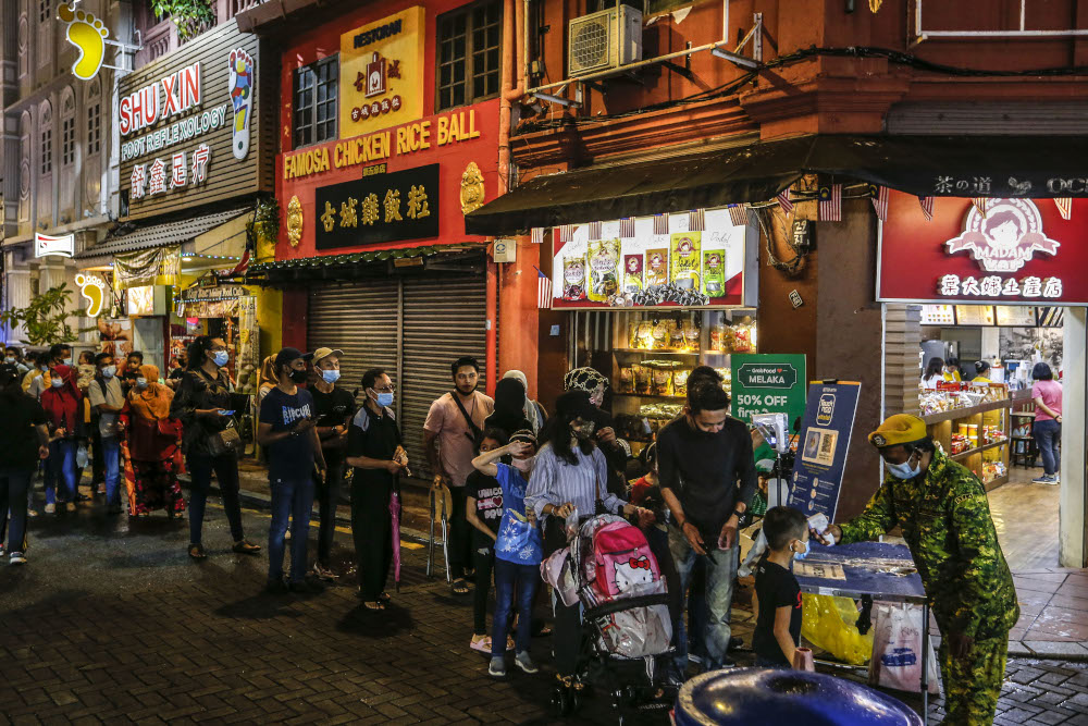 A view of the night scene at Jonker Street in Melaka December 28, 2020. u00e2u20acu201d Picture by Firdaus Latif