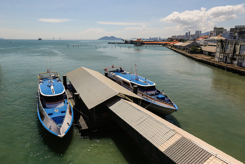 The new fast boats which will be replacing the old ferries are seen docked here at Swettenham Pier, December 28, 2020. u00e2u20acu201d Picture by Sayuti Zainudin