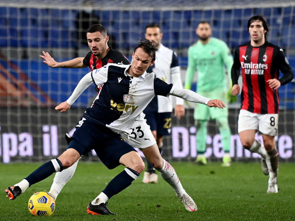 AC Milan midfielder Rade Krunic (left) fights for the ball with Sampdoria midfielder Albin Ekdal during the Italian Serie A football match Sampdoria vs AC Milan at the Luigi Ferrari stadium in Genoa December 6, 2020. — AFP pic