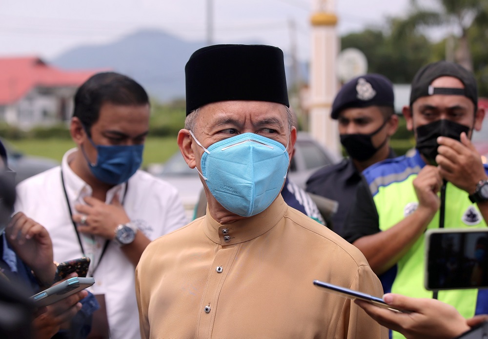 Member of Dewan Negara (the Advisory Council to the Ruler) Datuk Annuar Zaini speaks to reporters at Istana Kinta in Ipoh December 5, 2020. u00e2u20acu2022 Picture by Farhan Najib