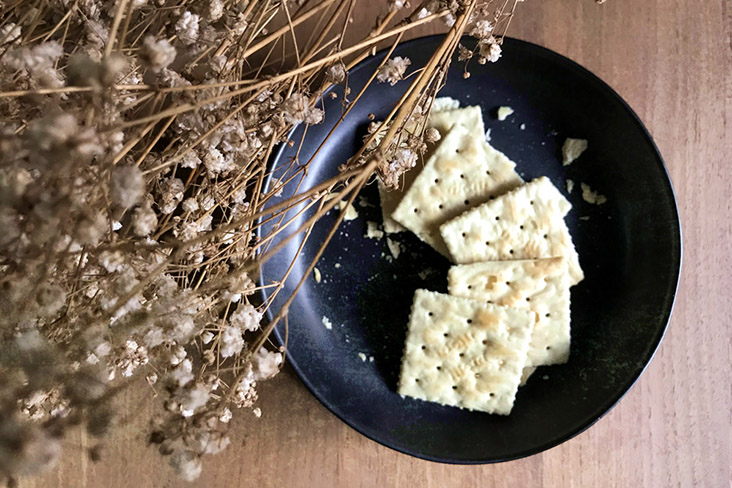 Plain crackers make for a perfect base for the cheeses.