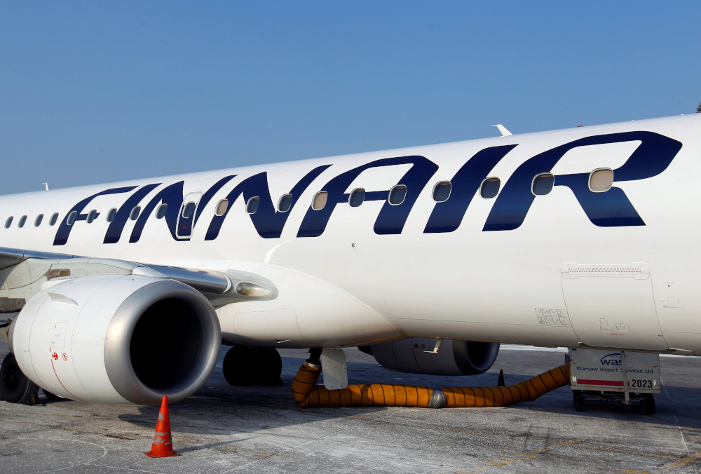 A Finnair airplane is docked at the Chopin International Airport in Warsaw February 6, 2012. u00e2u20acu201d Reuters picnn