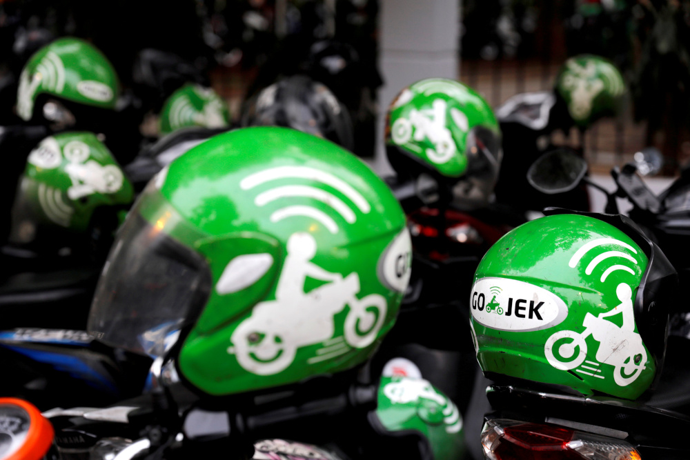 Gojek driver helmets are seen during Go-Food festival in Jakarta, Indonesia, October 27, 2018. u00e2u20acu201d Reuters picnn