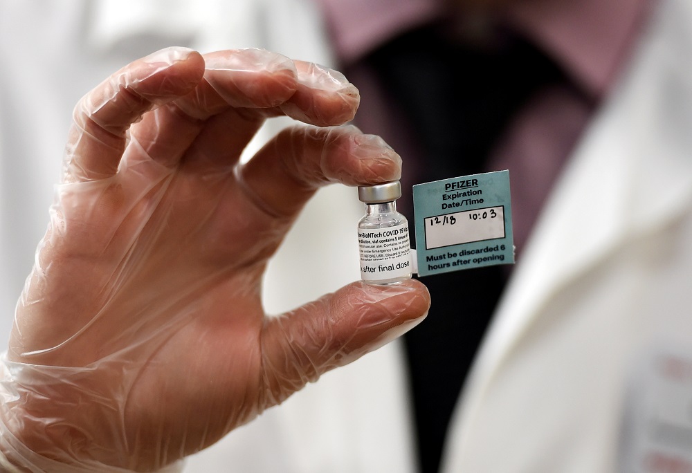 A vial of the Pfizer vaccine against the coronavirus disease used at The Reservoir nursing facility is shown in West Hartford, Connecticut December 18, 2020. u00e2u20acu2022 Pool via Reutersn