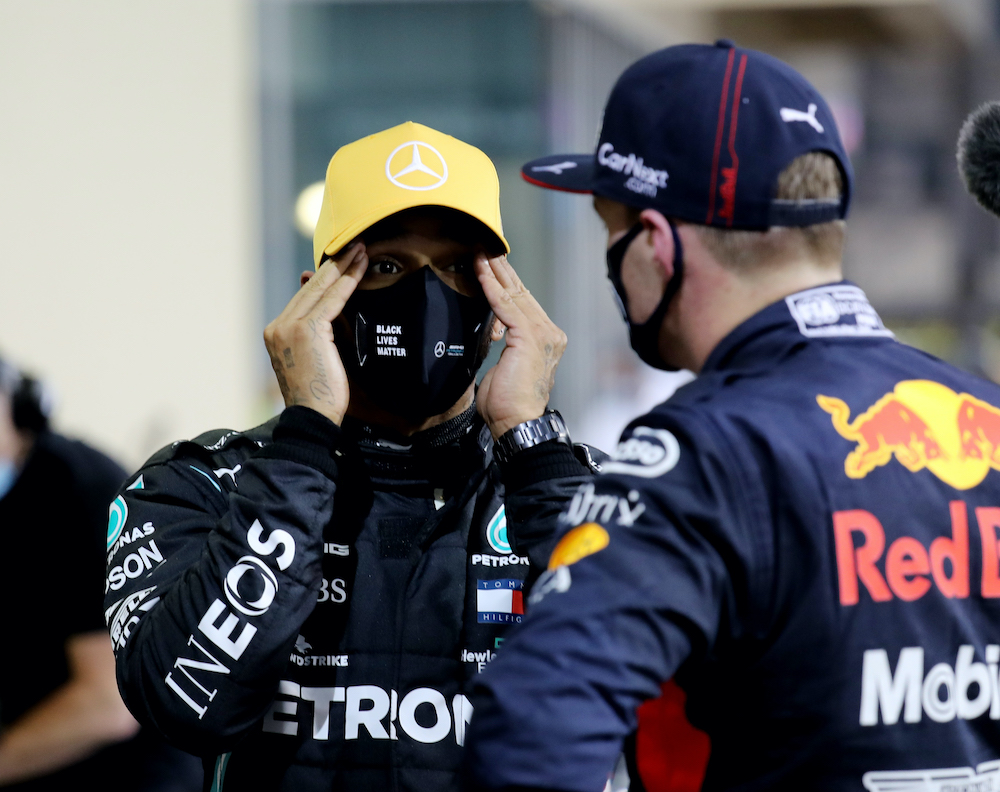 Mercedesu00e2u20acu2122 Lewis Hamilton speaks to Red Bullu00e2u20acu2122s Max Verstappen after qualifying for the Abu Dhabi Grand Prix at the Yas Marina Circuit in Abu Dhabi, United Arab Emirates, December 12, 2020. u00e2u20acu201d Reuters picnn