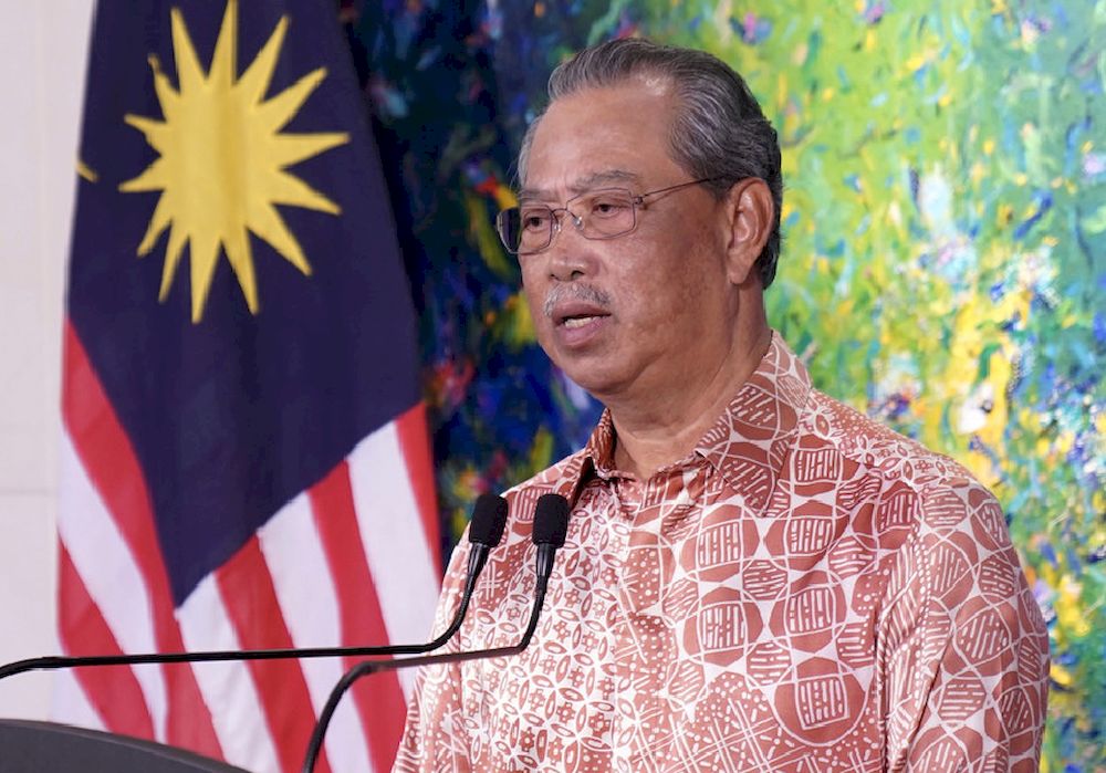 Prime Minister Tan Sri Muhyiddin Yassin delivering a live national TV address in conjunction with New Year 2021, December 31, 2020. u00e2u20acu201d Bernama pic