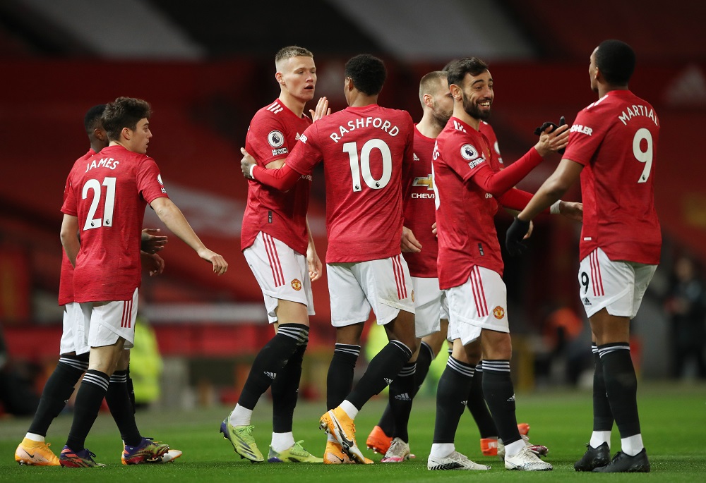 Manchester United's Scott McTominay celebrates with teammates after scoring the first goal against Leeds United December 21, 2020. u00e2u20acu2022 Pool via Reuters