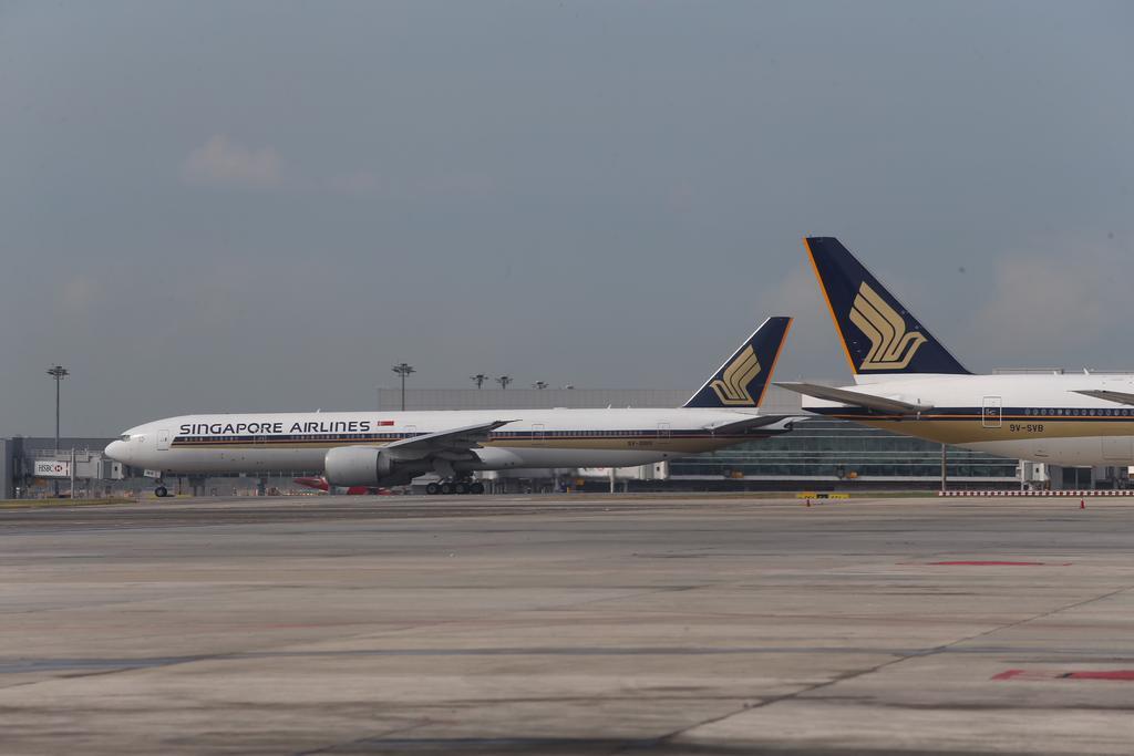 As part of the trial, passengers on board SIAu00e2u20acu2122s flights to Singapore must take their Covid-19 tests at selected clinics in Jakarta and Kuala Lumpur where they will be issued either a digital or paper health certificate with a QR code. u00e2u20acu2022 TODAY file pic