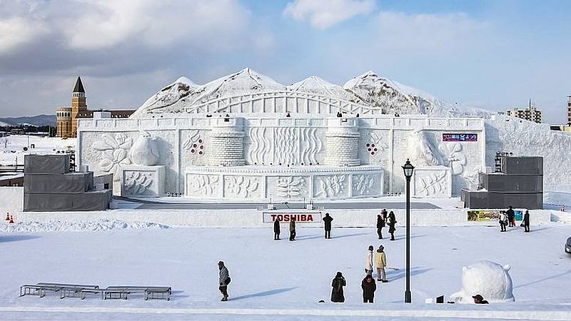 Giant snow sculpture depicting the Daisetsuzan Mountains at the Asahikawa 2011 winter festival. u00e2u20acu201d Picture courtesy of japan-guide.com