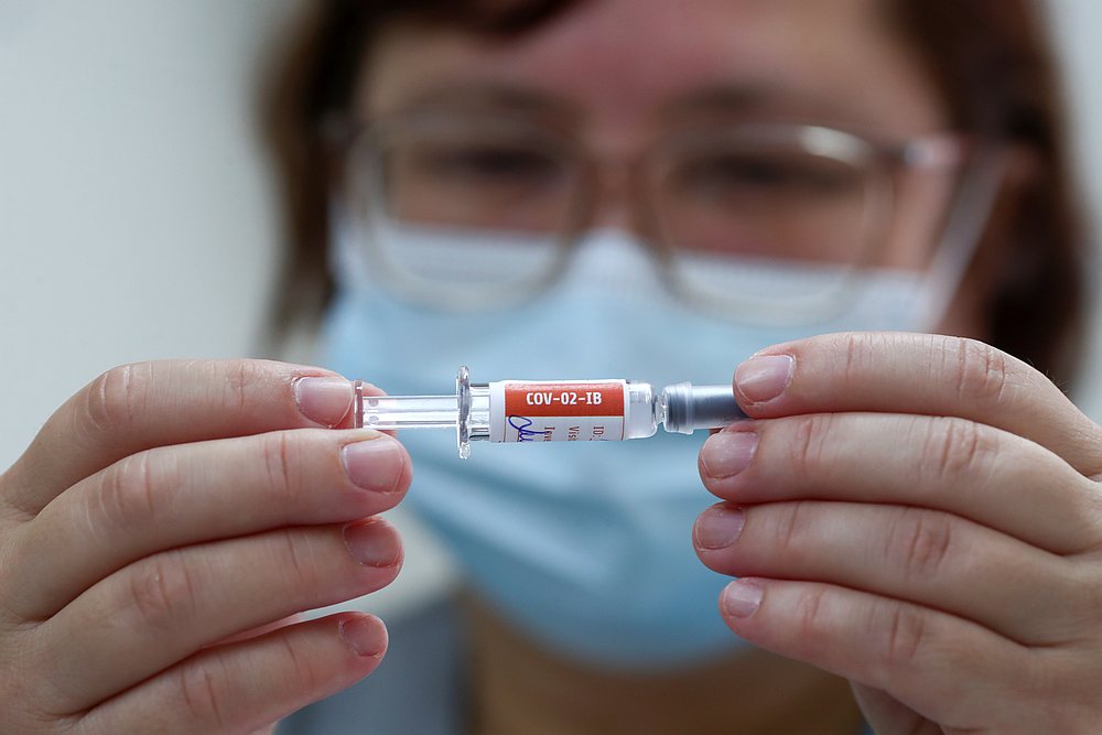 A nurse holds a syringe with SinoVac's Covid-19 vaccine before administering it to a volunteer of the vaccine trial, at Emilio Ribas Institute, in Sao Paulo, Brazil December 11, 2020. u00e2u20acu201d Reuters pic