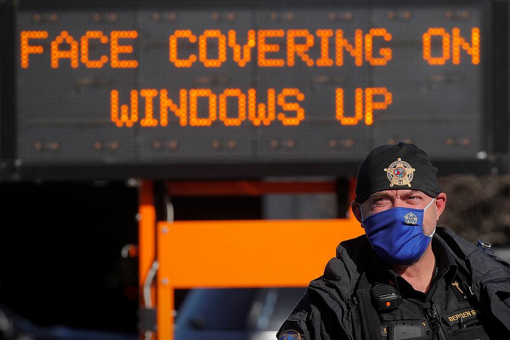 A Bergen County Sheriff deputy works at a Covid drive-thru testing centre at Bergen Community College in Paramus, New Jersey December 3, 2020. u00e2u20acu201d Reuters pic