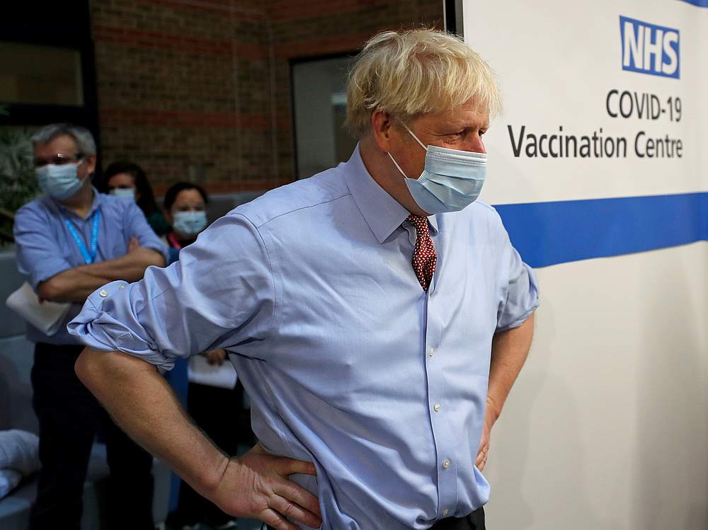 British Prime Minister Boris Johnson looks on during a Covid-19 vaccination at Guy's Hospital in London, Britain December 8, 2020. u00e2u20acu201d Pool pic via Reuters