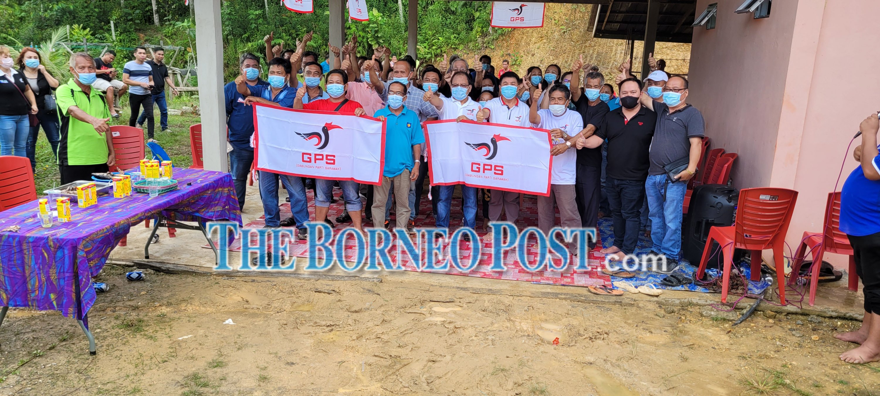 Brian Fung (fifth right, front row) and others at the pre-Christmas gathering organised by PDP Pakan Service Centre last Sunday. u00e2u20acu2022 Borneo Post pic