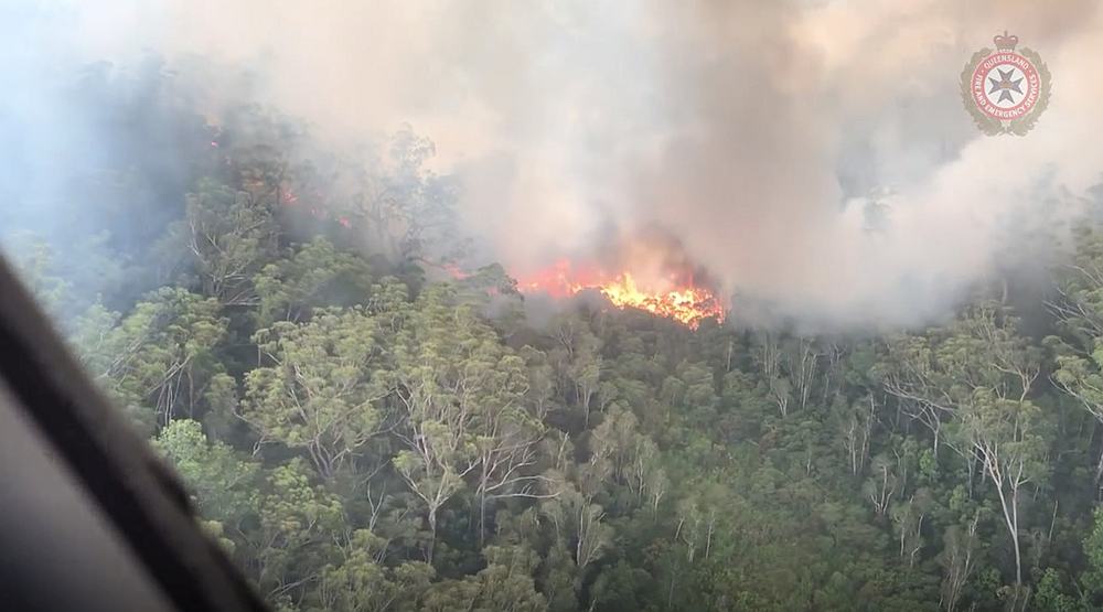 An aerial view shows bushfires on Fraser Island, Queensland, Australia December 2, 2020. u00e2u20acu201d Queensland Fire and Emergency Services video still image via Reuters