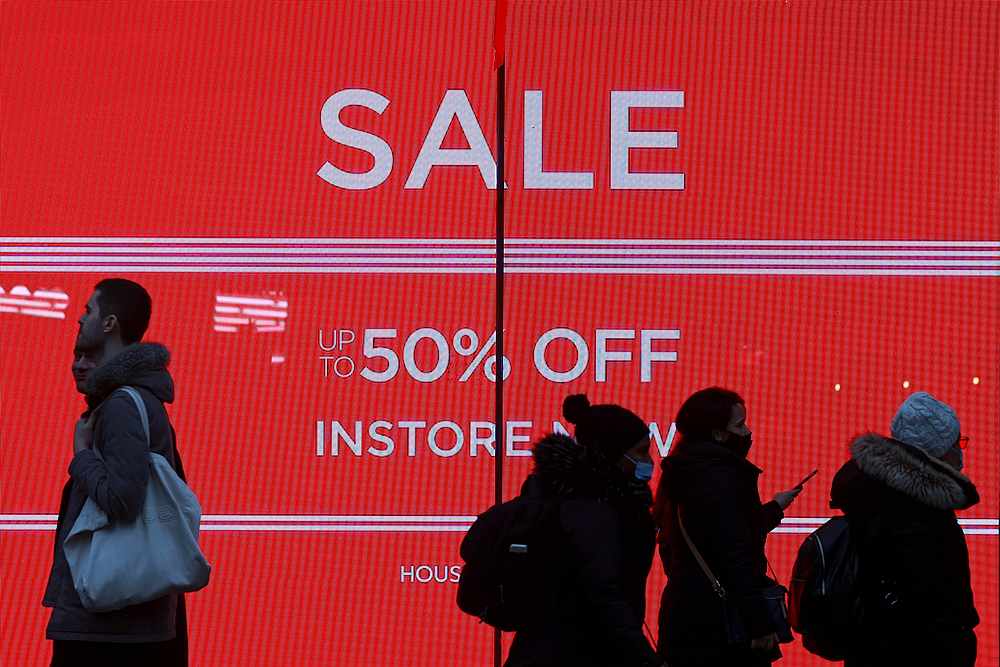 Shoppers walk down the street in London, Britain December 18, 2020. u00e2u20acu201d Reuters pic