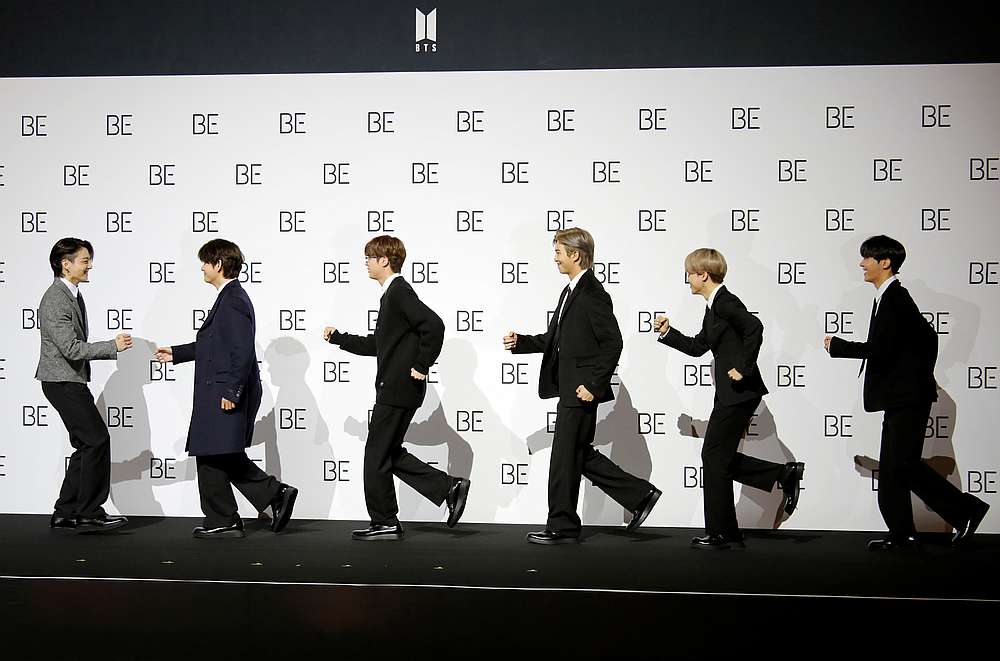 Members of K-pop boy band BTS pose for photographs during a news conference promoting their new album 'BE(Deluxe Edition)' in Seoul, South Korea November 20, 2020. u00e2u20acu201d Reuters pic