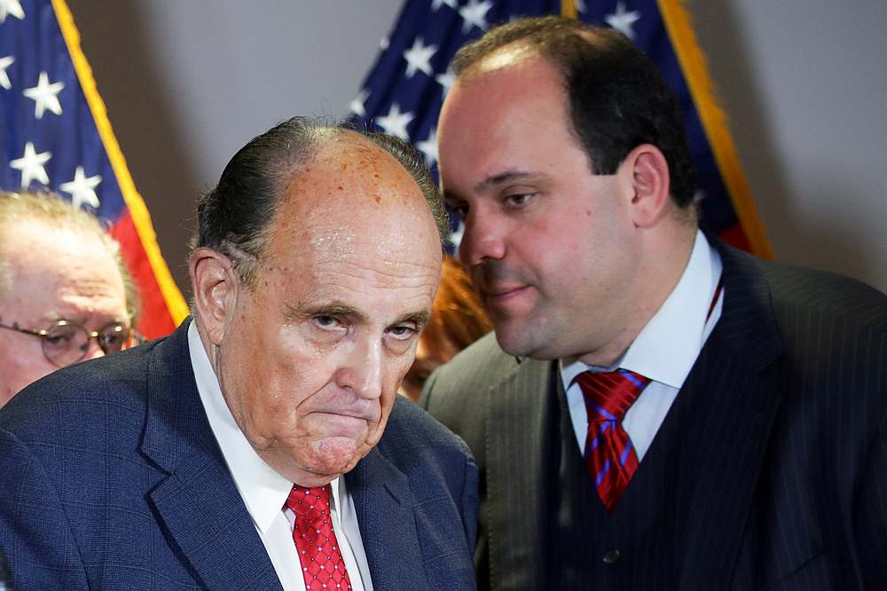 Trump campaign advisor Boris Epshteyn speaks to former Rudy Giuliani (left), personal attorney to US President Donald Trump, during a news conference in Washington November 19, 2020. u00e2u20acu201d Reuters pic