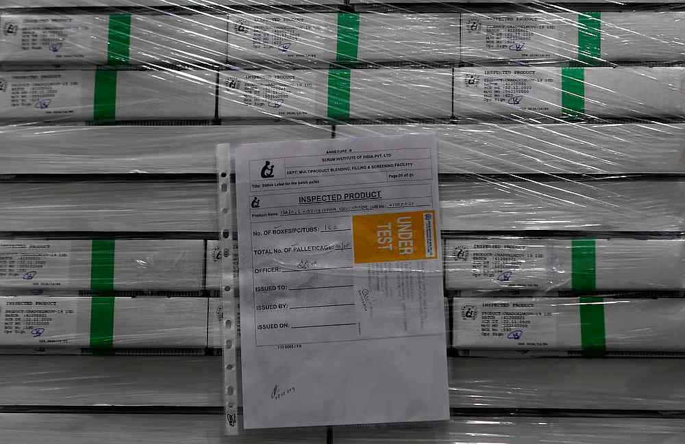 Boxes containing the vials of AstraZeneca's Covishield, Covid-19 vaccine, are seen inside a cold room at the Serum Institute of India, in Pune, India 30 November 2020. u00e2u20acu201d Reuters pic